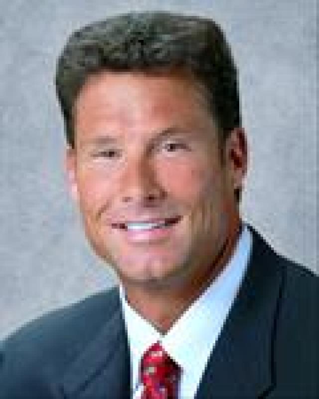 John E. Brigel