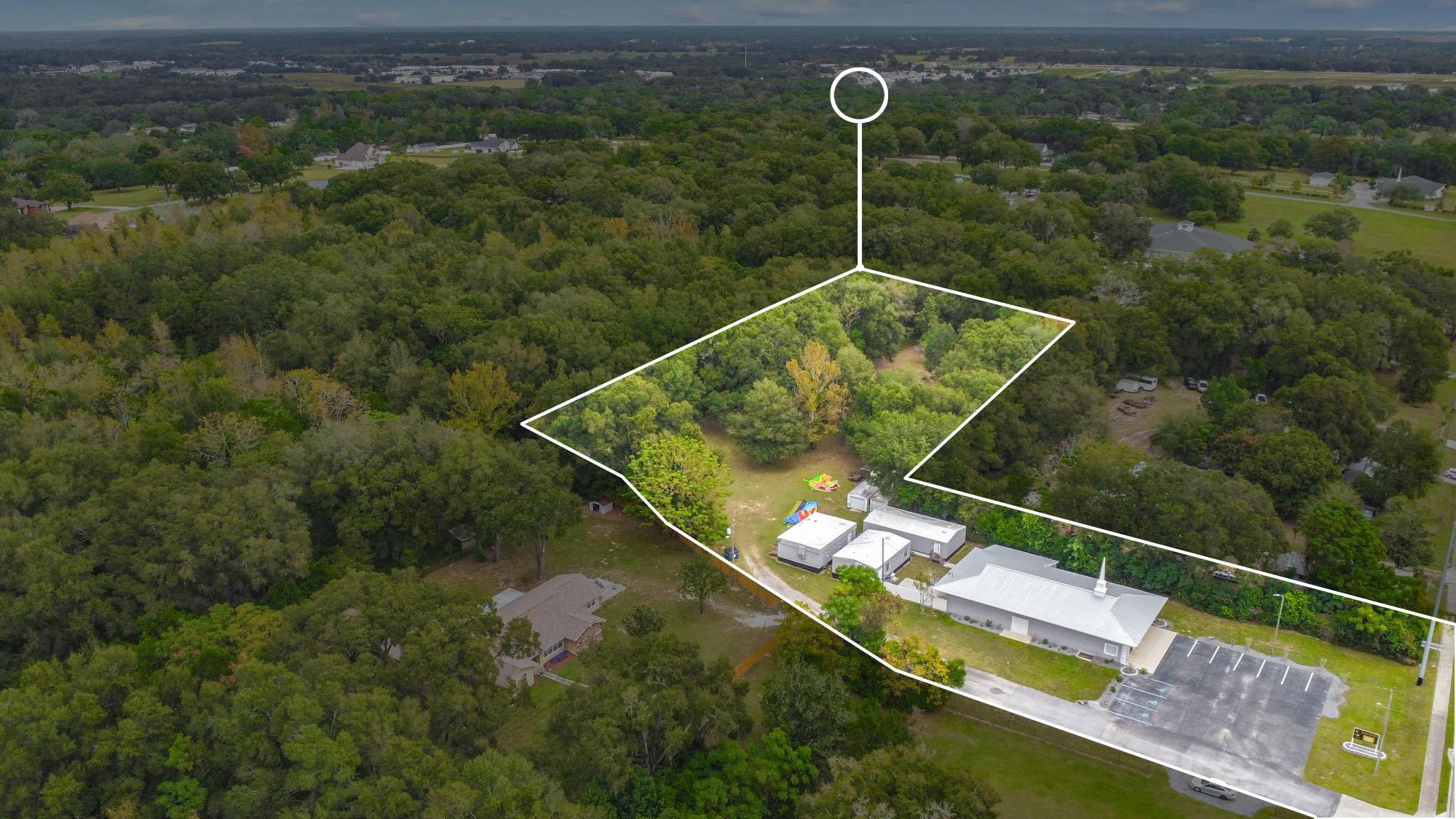 4 Buildings Approx. 4.5 acres Zoned C-2 & AR