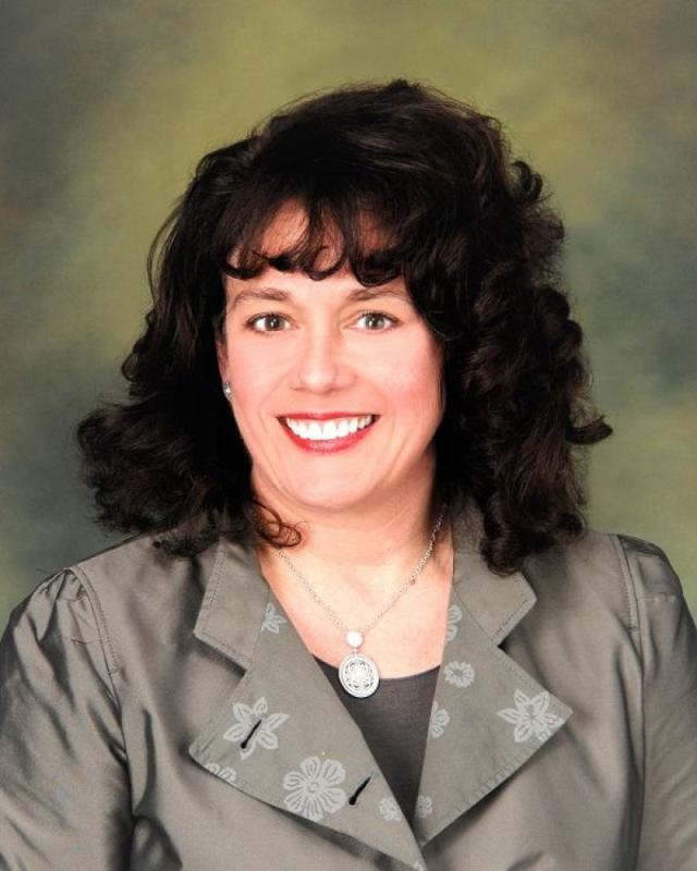 Linda Karam, Broker