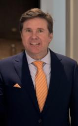 Chris Baker, CCIM, MAI, FRICS