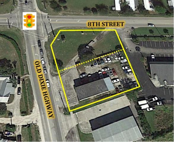 Auto Pawn Bldg with Fenced Storage Yard