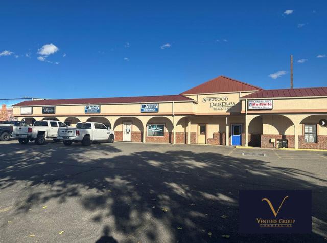 High-Visibility Retail Center w/ Car Wash