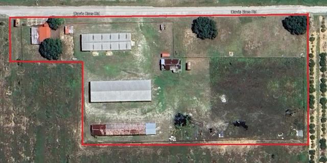 4.7  acres in Frostproof, FL w Warehouses
