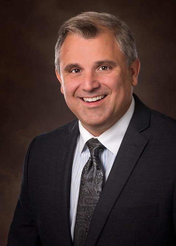 John E. Shaheen, CCIM