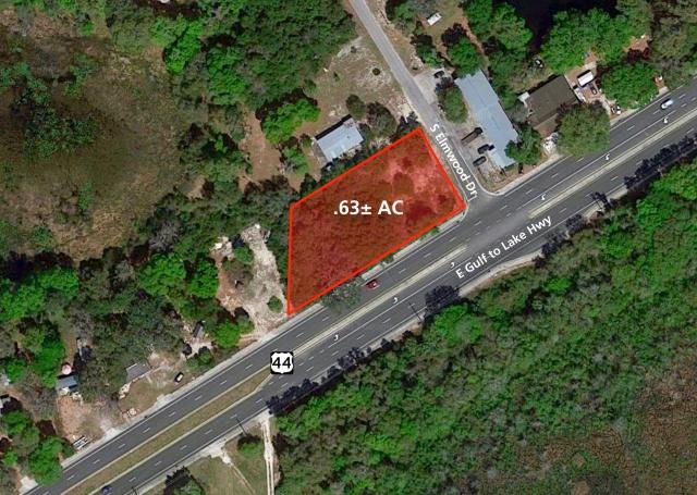 Online Auction: Commercial Corner Lot on Hwy