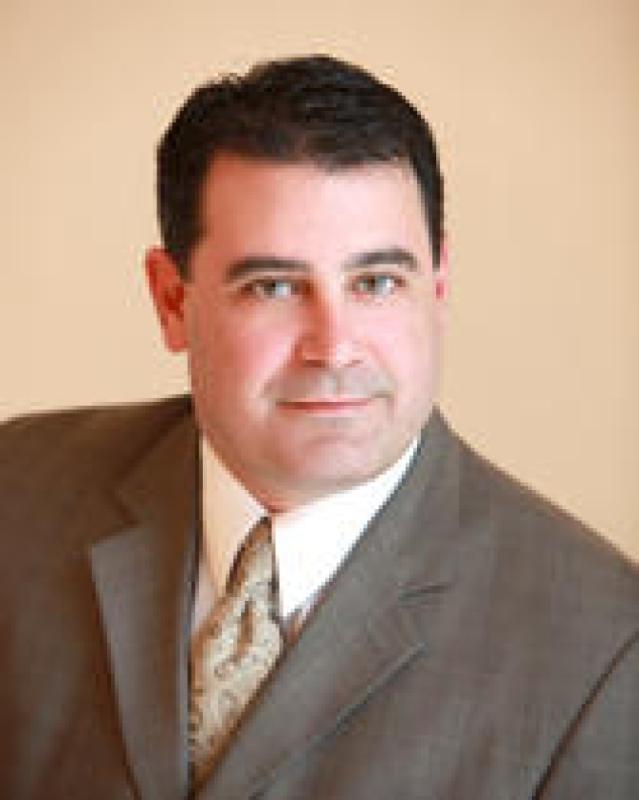 Kenneth M. Kujawa, CCIM