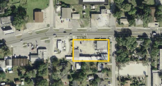 Commercial Buildings and Fenced Storage Yard