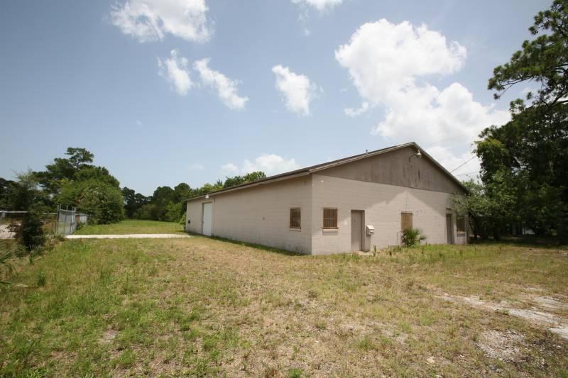 Warehouse and Fenced Storage Yard