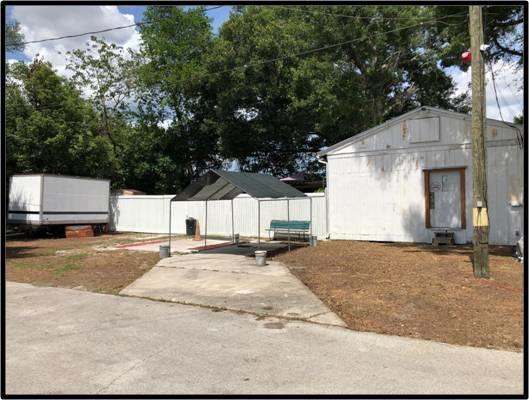 Industrial Building on 1/2 acre fenced yard