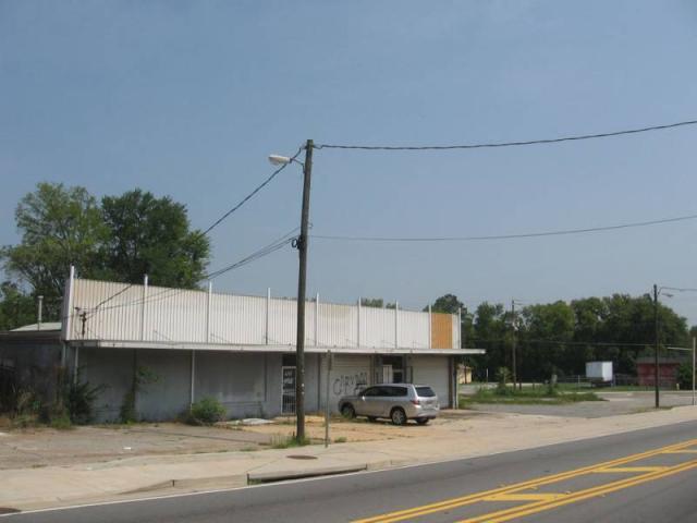 Office/Warehouse with Vacant Corner Lot