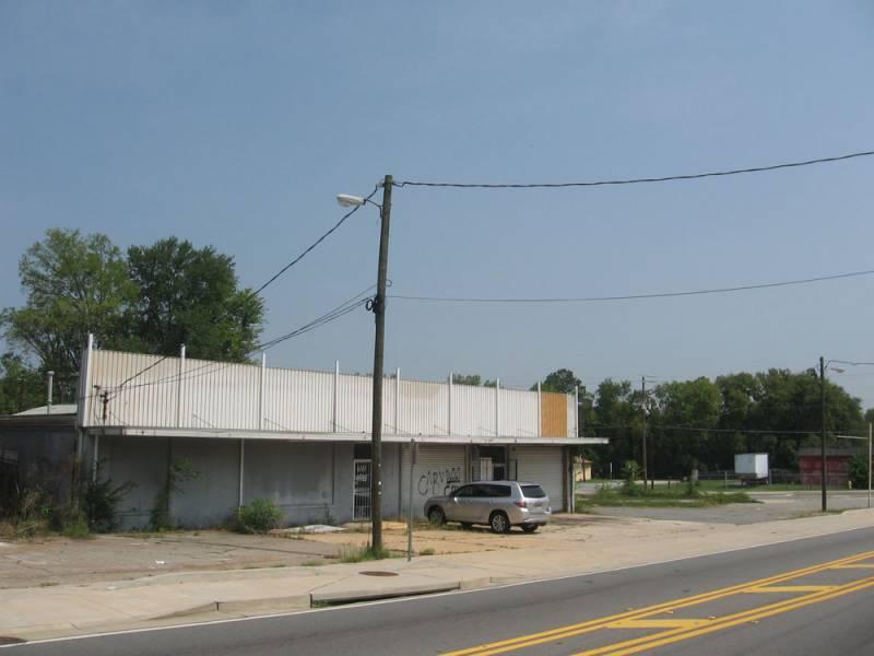Office/Warehouse with Vacant Corner Lot
