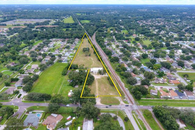 5.09 +/- Acres with 4,000 SF Metal Building,